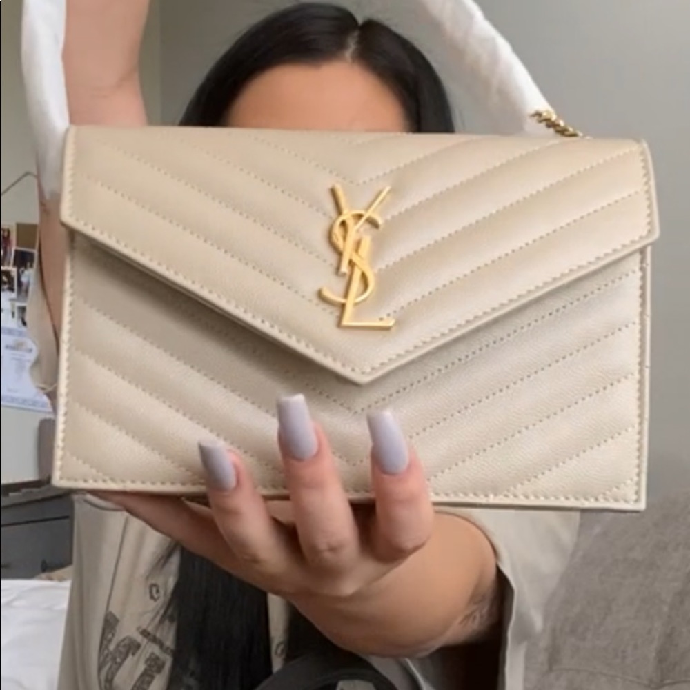 Saint Laurent
Monogram Quilted Leather Chain Wallet in dark creme